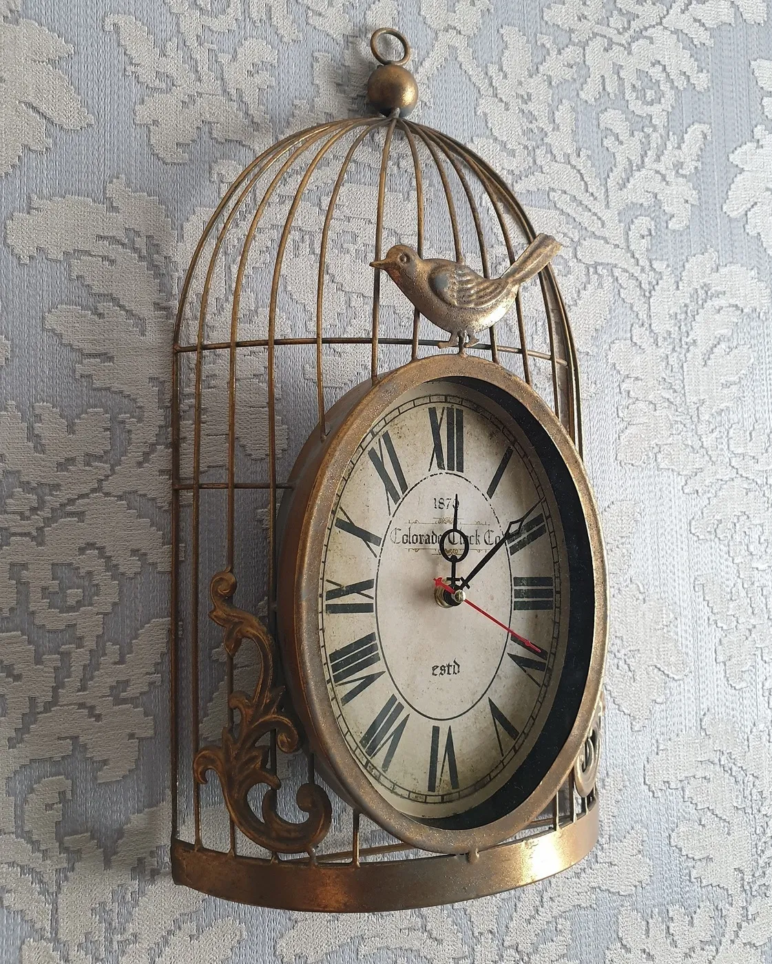 Часы настенные в виде клетки с птичкой